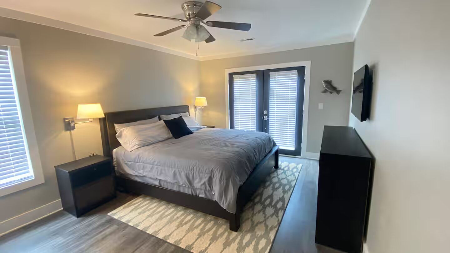 The primary bedroom with French doors
