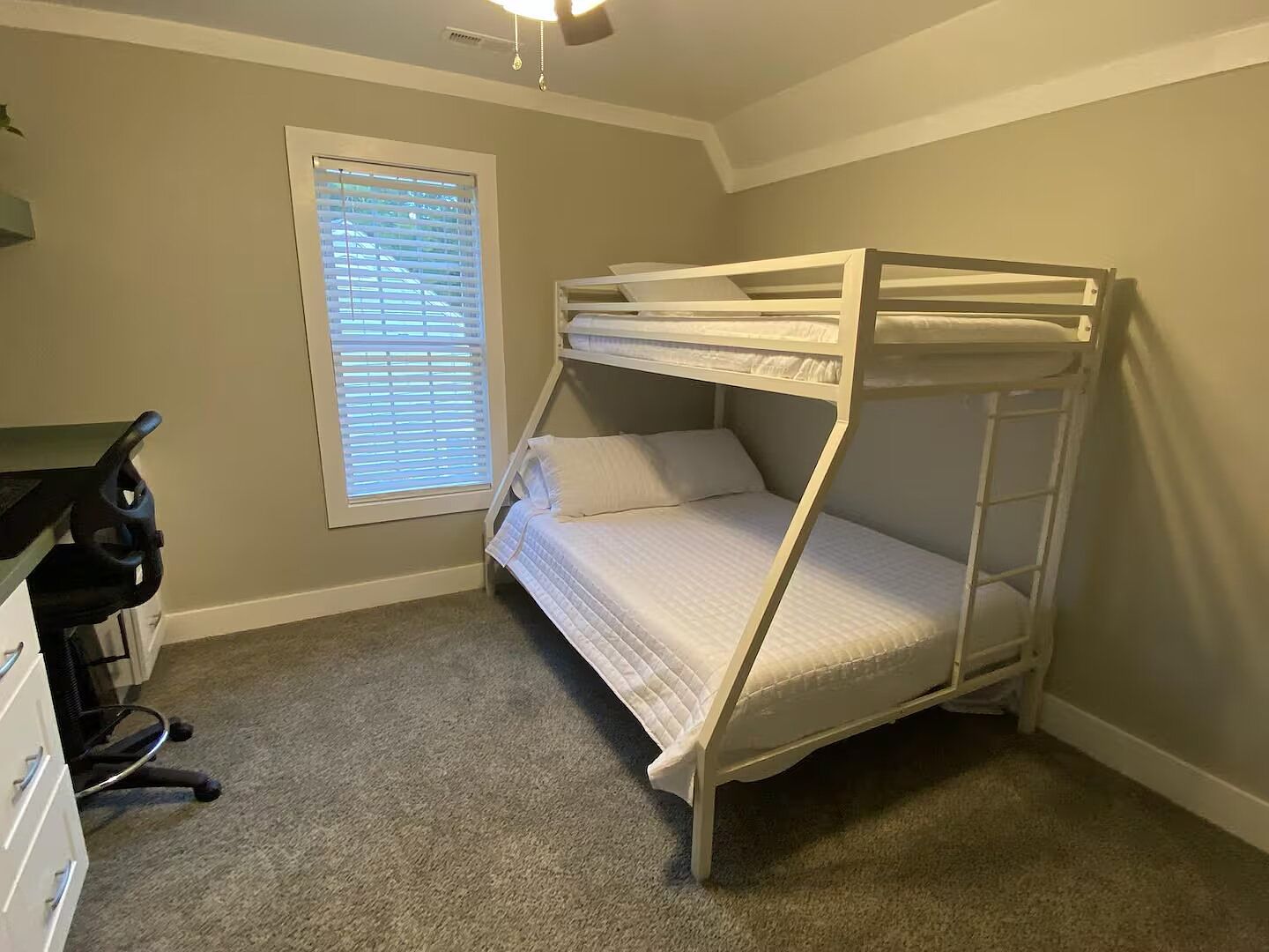 The bunk bedroom with desk nook